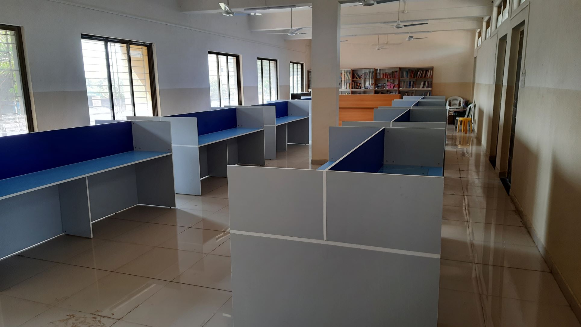 A cozy reading corner in the library with comfortable seating